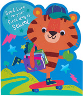 UK Greetings First Day at School greeting card for boys featuring a cute tiger cartoon and an envelope.