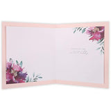 UK Greetings floral 50th birthday greeting card with colorful floral design and elegant lettering.