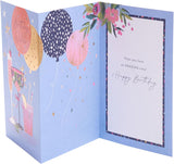 UK Greetings floral cocktail design birthday greeting card with colorful floral and cocktail illustrations on the front.
