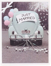 UK Greetings wedding greeting card for couples, featuring contemporary photographic design celebrating a just married occasion.