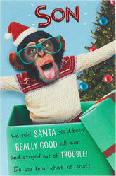 UK Greetings funny cheeky champ design Christmas card for son, featuring humorous holiday greeting and festive imagery.