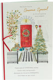 UK Greetings Christmas card featuring a front door scene with festive decorations and a "Someone Special" message.