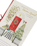 UK Greetings Christmas card featuring a front door scene with a warm, festive design for someone special.