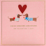 UK Greetings girlfriend Valentine's Day card featuring a cute sausage dog couple design with an envelope.