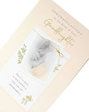 UK Greetings gold foil details congratulations card for new granddaughter, featuring festive design and heartfelt message.