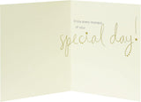 UK Greetings Golden Stars Happy Birthday greeting card featuring shiny gold stars and festive "Happy Birthday to You" message.