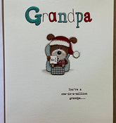 UK Greetings Grandpa Lots of Woof Christmas Card showing festive dog-themed greeting card with colorful holiday design.