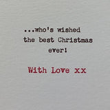 UK Greetings Grandpa Lots of Woof Christmas Card featuring festive dog illustrations, perfect for holiday greeting cards.