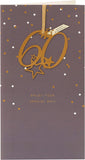 UK Greetings Happy 60th Birthday greeting card with a hanging keepsake, featuring colorful birthday design and festive decorations.