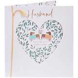 UK Greetings romantic greeting card for husband featuring a pair of adorable sausage dogs in a charming design.