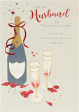 UK Greetings husband Valentine's Day card with envelope featuring an elegant champagne design, perfect for expressing love.