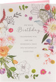 UK Greetings Into the Meadow greeting card with a cute floral design, featuring colorful flowers and a charming nature-inspired scene.