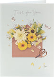 UK Greetings floral birthday card featuring a colorful floral design, perfect for celebrating special occasions.