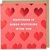 UK Greetings Kindred Valentine’s Day card featuring a cheerful design with "Happiness Is Binge-Watching with You" message for loved ones.