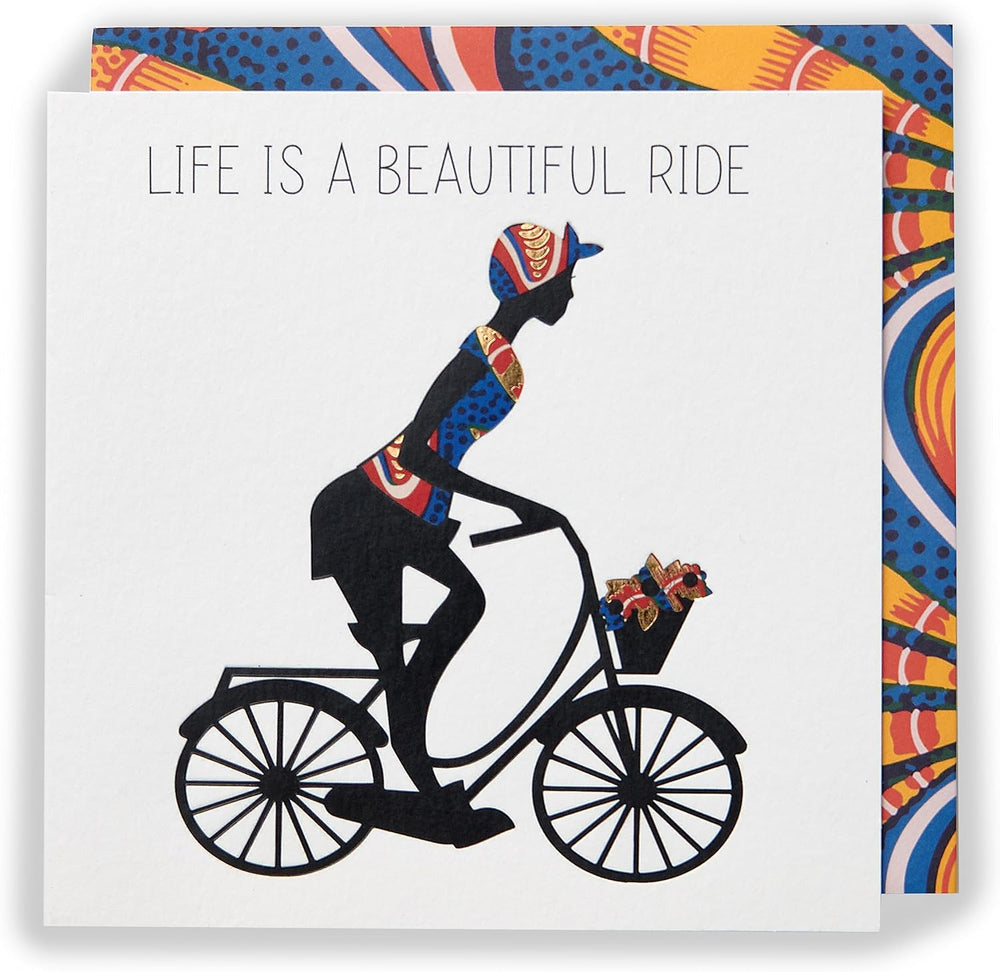 UK Greetings Kindred X Afrotouch greeting card featuring colorful artwork and the message "Life Is a Beautiful Ride."