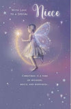 UK Greetings Christmas greeting card featuring a fairy, wand, and stars design for niece, with festive holiday imagery.