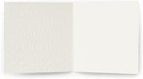 UK Greetings metallic foil dots design male birthday greeting card with colorful celebration pattern on the front.