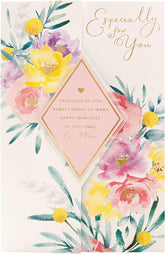 UK Greetings Mother's Day card with envelope featuring a beautiful floral design, perfect for celebrating mothers.