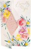 UK Greetings Mother's Day card with envelope featuring a beautiful floral design, perfect for celebrating moms.