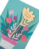 UK Greetings Mother's Day card with envelope featuring bright potted plant design, 149 x 229mm greeting card for special occasions