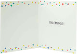 UK Greetings multicolour design good luck exam card featuring vibrant colors and cheerful message for students.