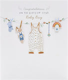 UK Greetings New Baby Boy greeting card featuring a washing line design with cute baby clothes and cheerful illustrations.