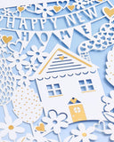 UK Greetings luxury laser cut congratulations card for new home, featuring intricate design and elegant greeting for special occasions.