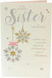 UK Greetings off-white Christmas card for sister with festive design, perfect for holiday greetings from the UK Greetings brand.