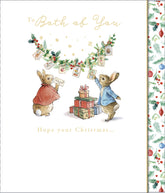 UK Greetings Peter Rabbit Christmas greeting card featuring Peter Rabbit and friends with festive holiday message.