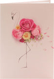 Pink floral flamingo birthday greeting card from UK Greetings featuring vibrant flower designs and a cheerful flamingo illustration.