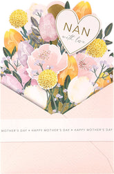 UK Greetings pop-up Nan Mother's Day card featuring colorful floral design and intricate paper craft, ideal for celebrating moms.