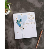 UK Greetings Pretty Hearts Design anniversary greeting card for Mum and Dad, featuring colorful heart illustrations.
