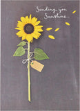 UK Greetings Sending You Sunshine sunflower design greeting card with bright sunflower illustration and cheerful message.