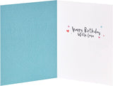 UK Greetings silver foil lettering husband birthday greeting card with elegant design and festive message on front.
