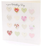 UK Greetings wedding greeting card with elegant luxury detail, featuring simple and stylish design for special occasions.