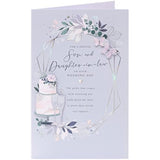 UK Greetings wedding day card for son and daughter-in-law, featuring elegant design and heartfelt message for special occasions.