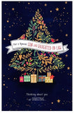 UK Greetings Son & Family Multi-Caption Christmas Card with festive holiday design and cheerful messages for special occasions