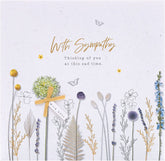 UK Greetings sympathy card featuring a natural design with "Sorry for Your Loss" and "Thinking of You" message.