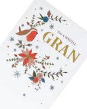 UK Greetings floral embroidery Christmas card featuring hand-finished design and festive floral patterns.