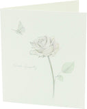 UK Greetings sympathy card featuring a delicate floral design, perfect for expressing condolences with a heartfelt message.