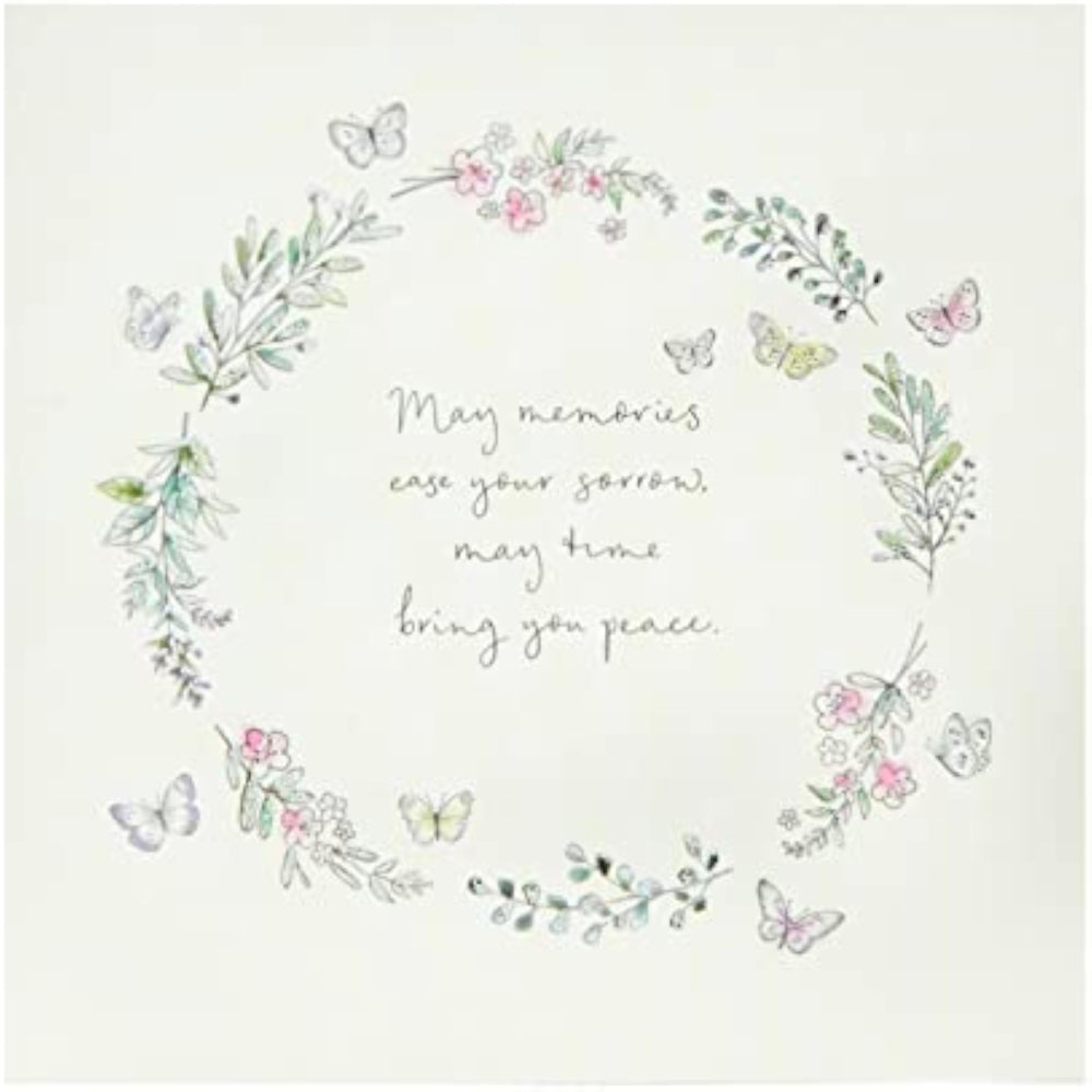UK Greetings sympathy greeting card featuring sentimental verse and a delicate floral butterfly design.