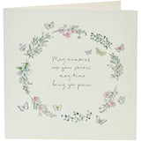 UK Greetings sympathy card featuring a floral butterfly design and sentimental verse, ideal for expressing condolences.