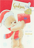 UK Greetings teddy bear with present design Christmas card for Godson, featuring festive holiday-themed greeting card imagery.