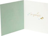 UK Greetings Thank You for Caring greeting card with heartfelt message, featuring floral design and elegant typography.