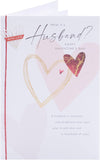 UK Greetings Valentine's Day card for husband featuring a "What Is a Husband?" design, showcasing a romantic greeting card with love-themed artwork.