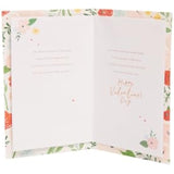 UK Greetings Valentine's Day card for wife with bright floral design, featuring colorful flowers and romantic message.