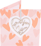 UK Greetings Mother's Day Card for Mum with keepsake heart attachment, featuring a heartfelt design for celebrating mothers.