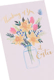 UK Greetings Easter card featuring daffodils in a vase with a "Thinking of You" message on floral stationery design.