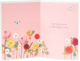 UK Greetings Into the Meadow female birthday card featuring floral and nature-inspired design on high-quality stationery.
