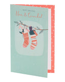 UK Greetings Nan & Grandad Christmas Card featuring festive stockings, ideal for holiday greeting stationery.